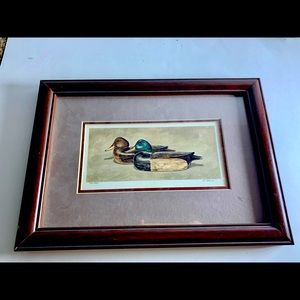Vintage print of two wooden ducks